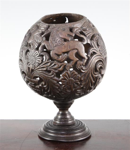 A 19th century carved and pierced coconut cup or goblet, 7.25in.